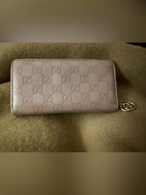 Gucci Blush/Taupe GG Embossed Zippy Leather Wallet.